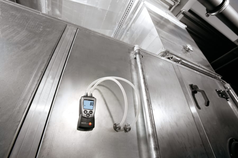 Measuring differential pressure on filters